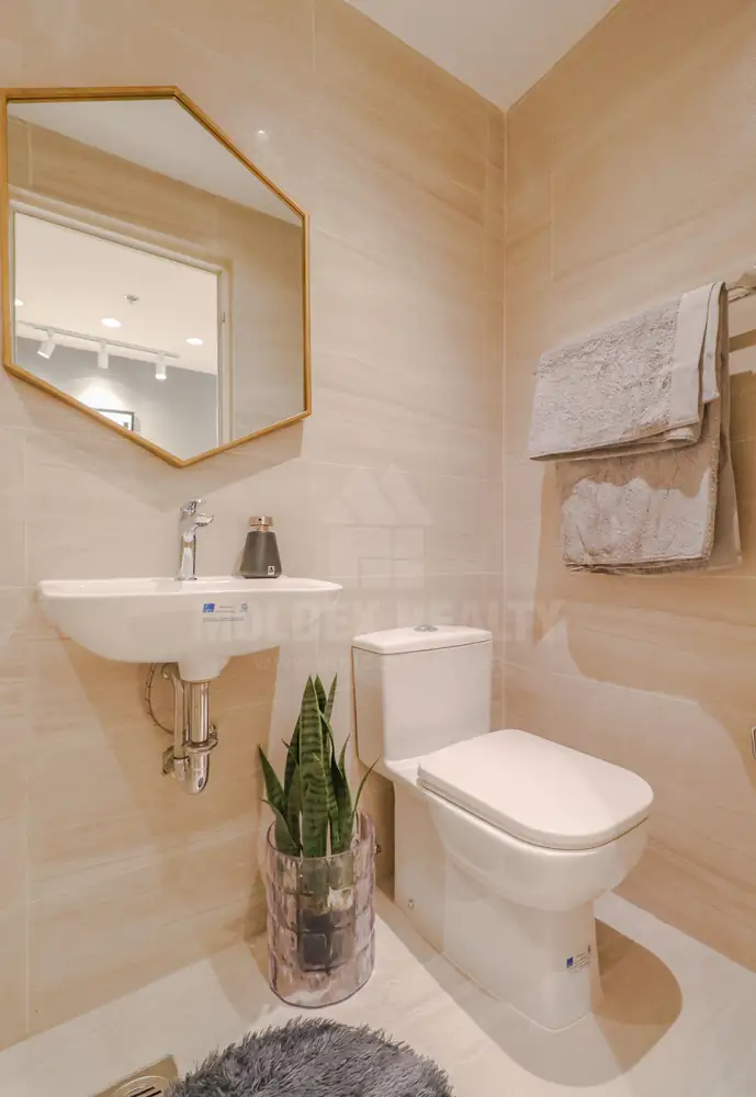 What the 1-bedroom toilet and bath looks like in the dressed model